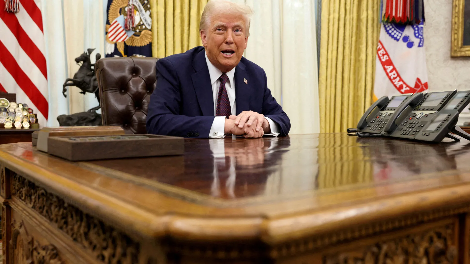 Trump defende tarifas sobre carros e diz que ação terá impacto positivo na indústria dos EUA - img
